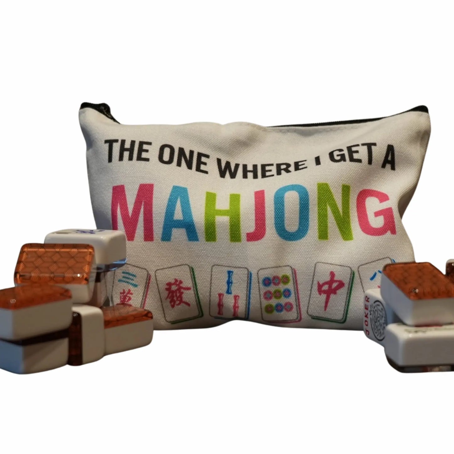 Cosmetic bag with 'The One Where I Get a Mahjong' text and mahjong tiles on a white background