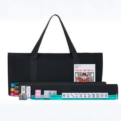 American mahjong set showing black soft carrying bag with white engraved tiles and multicolor rack and pusher
