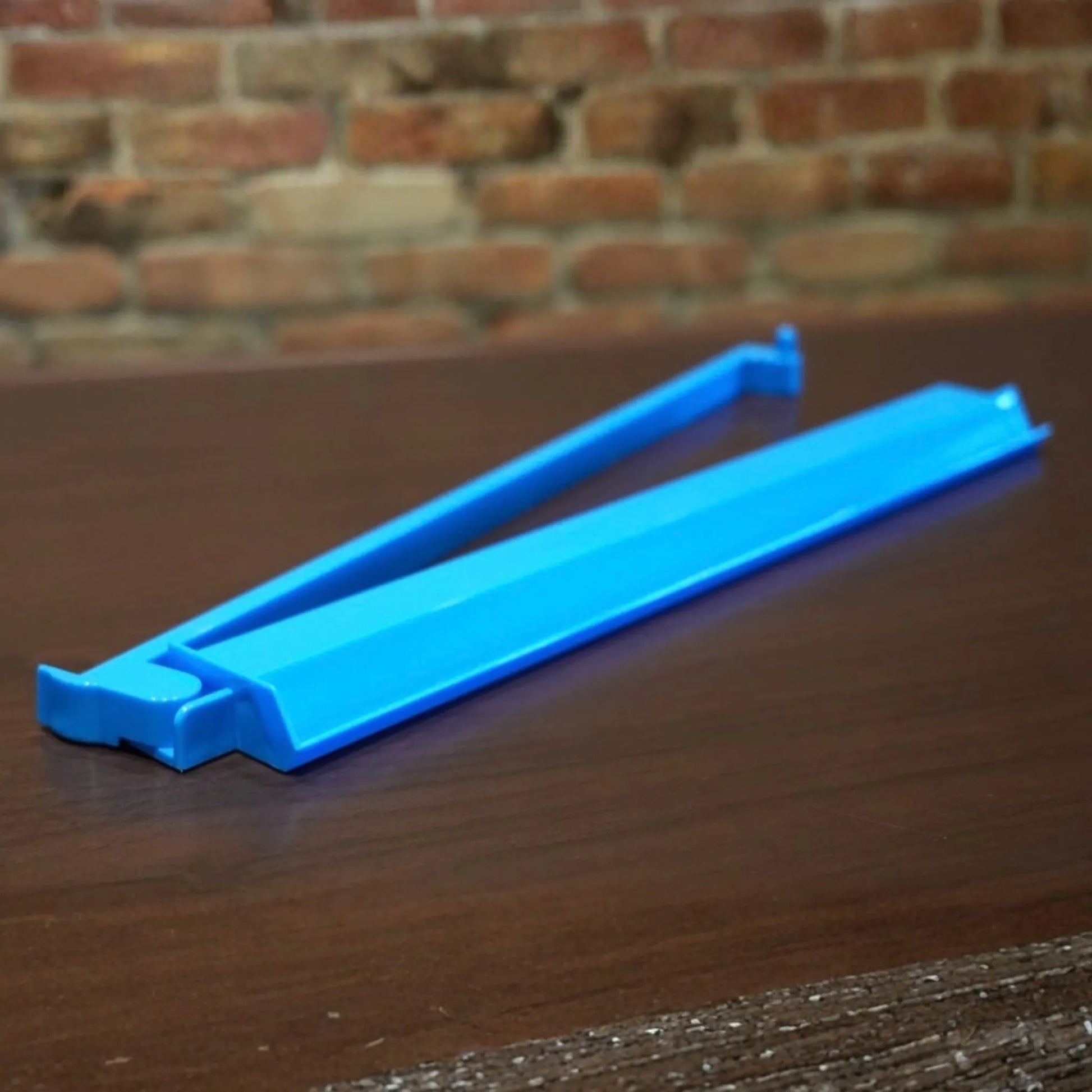 Blue Charleston Club mah jongg tile pusher for smooth tile alignment