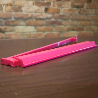 Pink Charleston Club mah jongg tile pusher for organized gameplay
