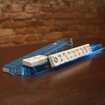 Side view of blue acrylic mah jongg rack and pusher