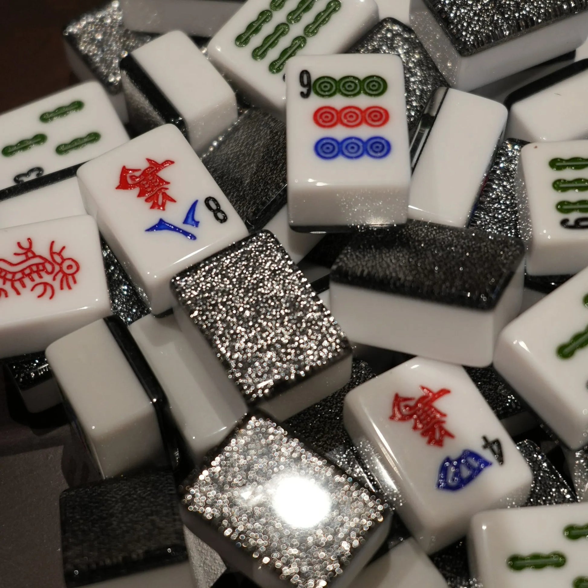 Gray sparkle 36mm automatic mahjong tiles with glitter faces and red blue symbol details

