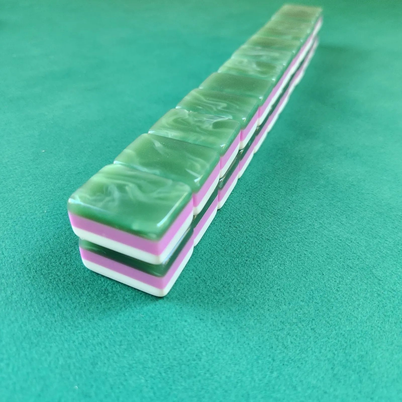 Stacked Jade 30MM American Mah Jongg tiles showing green backs and side detail