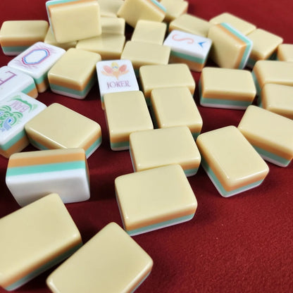 Lemon Sherbet 30MM American mah jongg tiles displayed on tabletop with Joker tiles