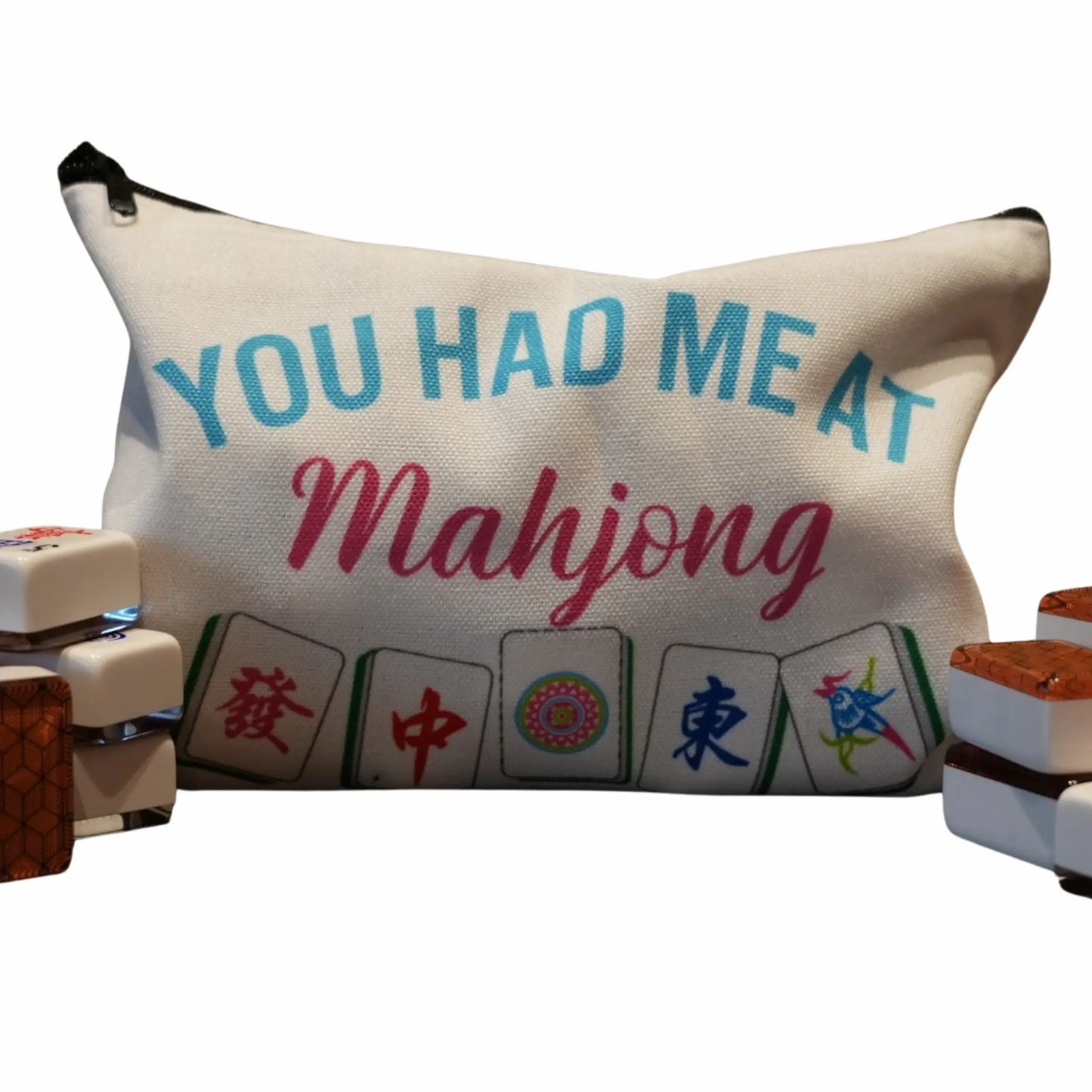 Canvas bag with 'You Had Me At Mahjong' text and mahjong tiles design, with actual mahjong tiles on sides.