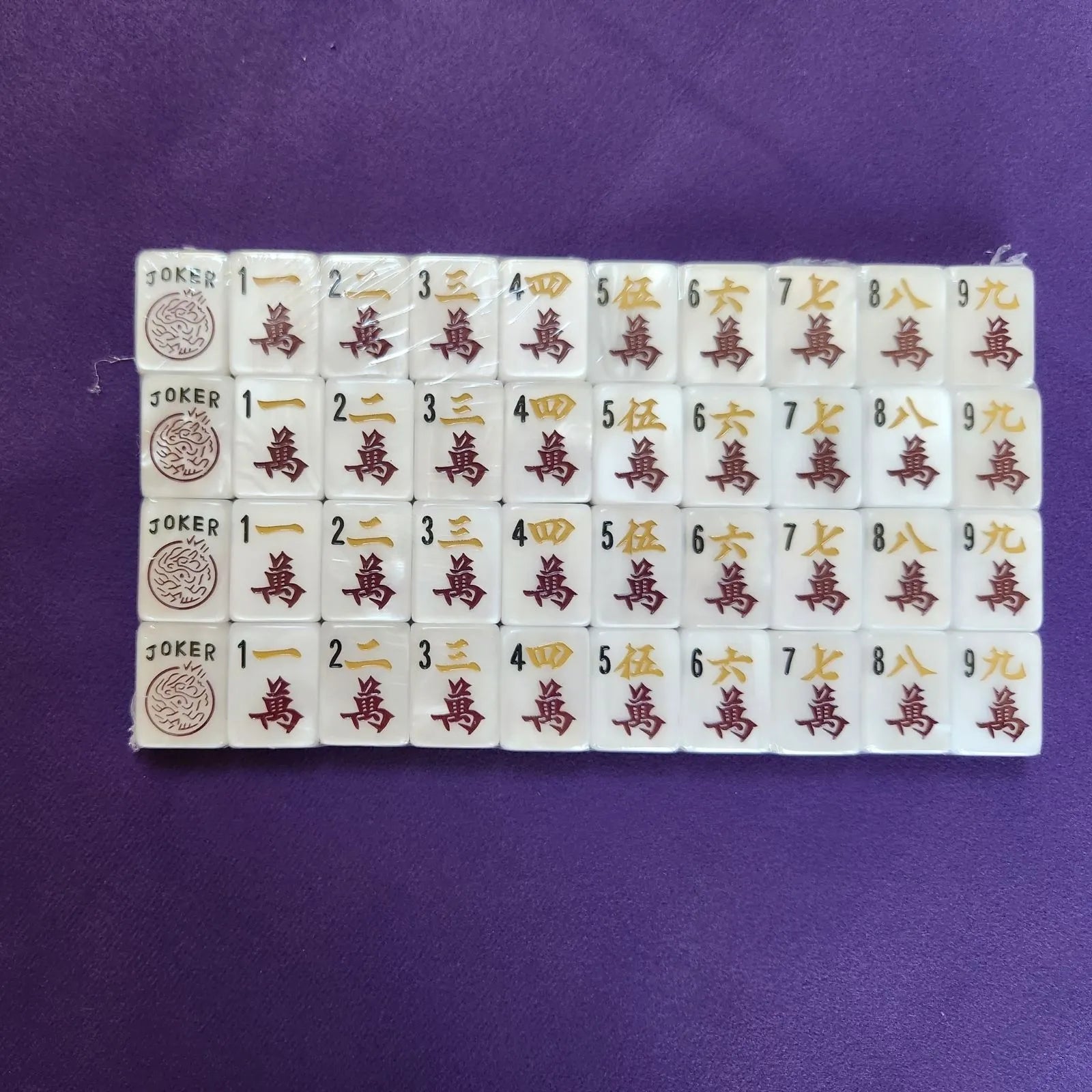 Mother of Pearl 30MM American Mah Jongg crack suit tiles arranged in rows