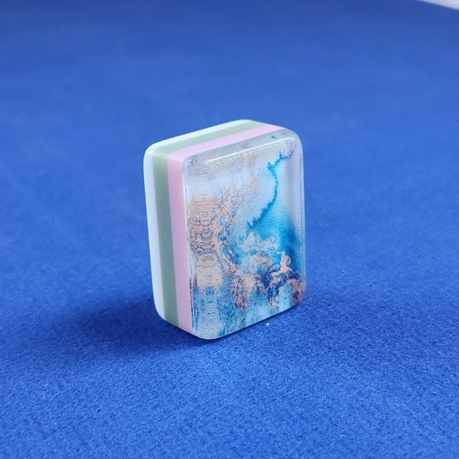 Close-up of Ocean Wave 30MM American Mah Jongg tile showing blue patterned edge and white face