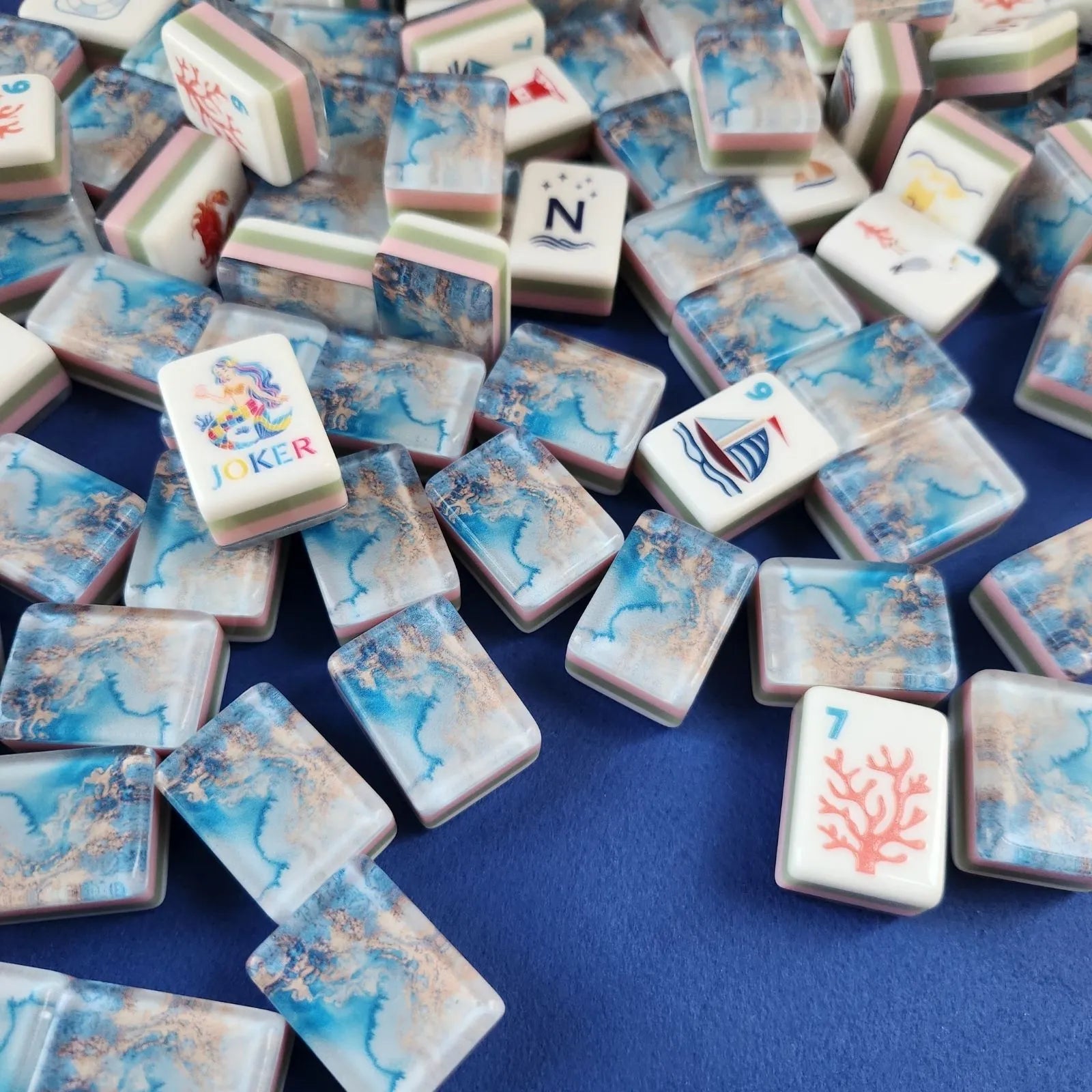 Ocean Wave 30MM American Mah Jongg tiles displayed in rows on a game table