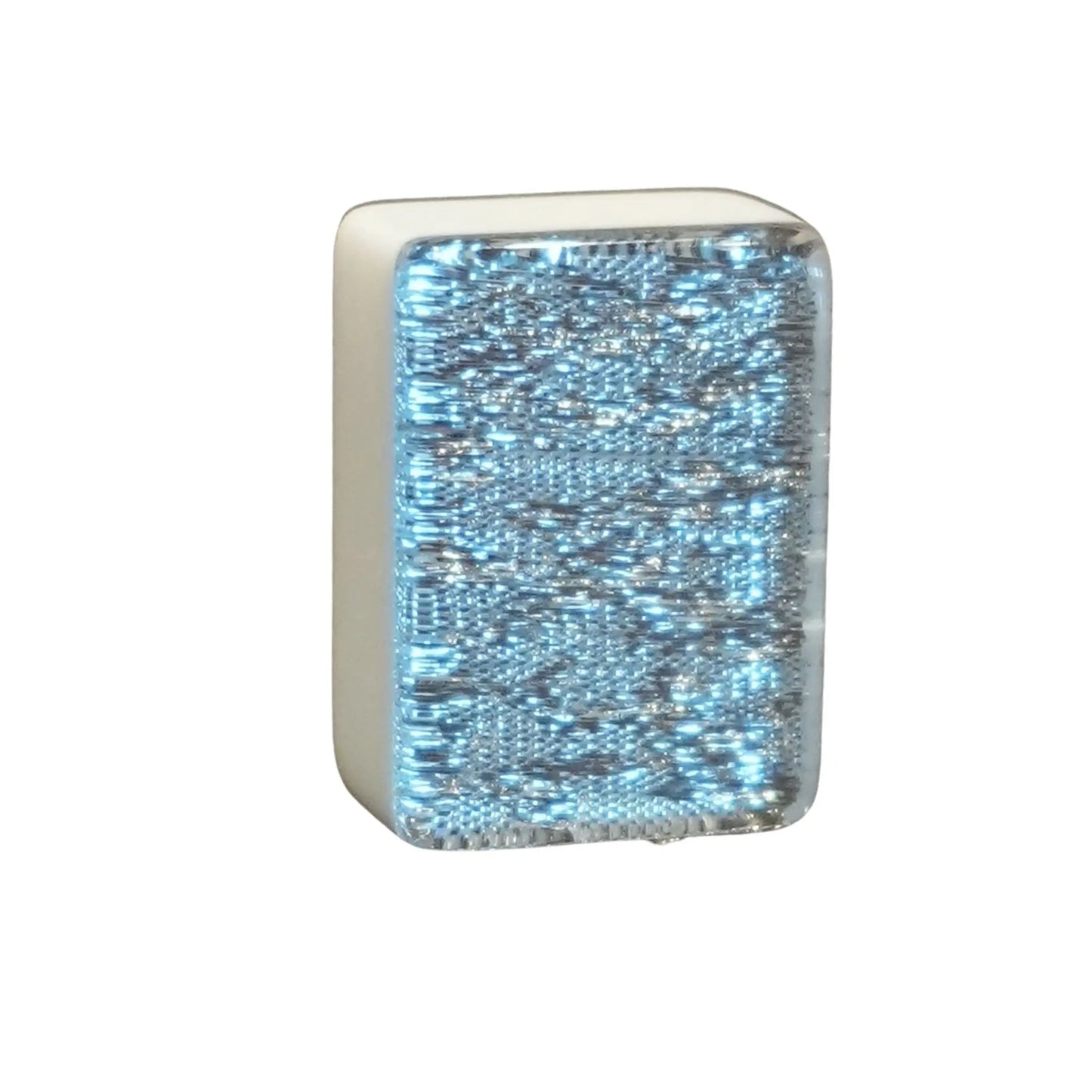 Single silver sparkle 36mm automatic mahjong tile with glitter face on wooden surface