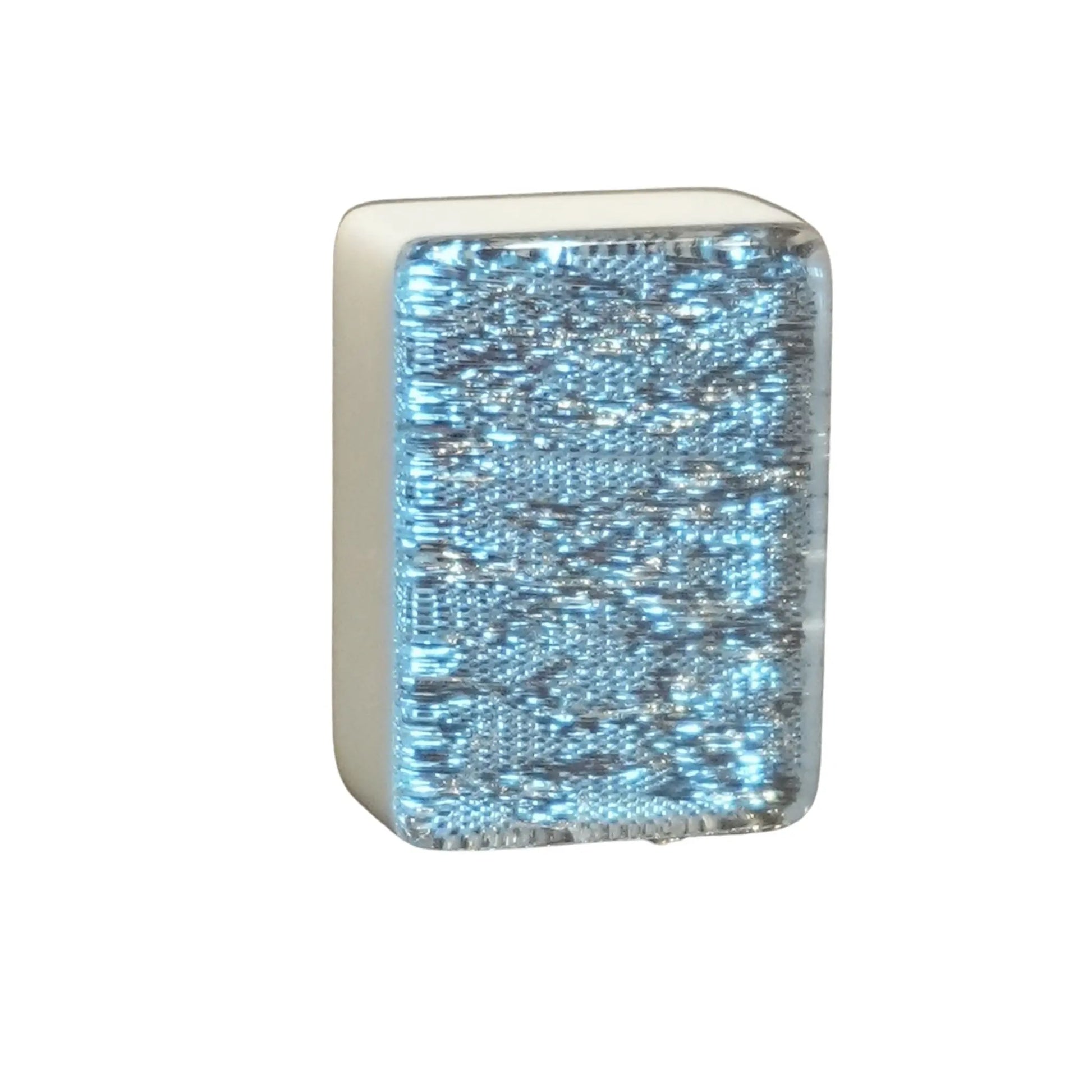 Single silver sparkle 36mm automatic mahjong tile with glitter face on wooden surface