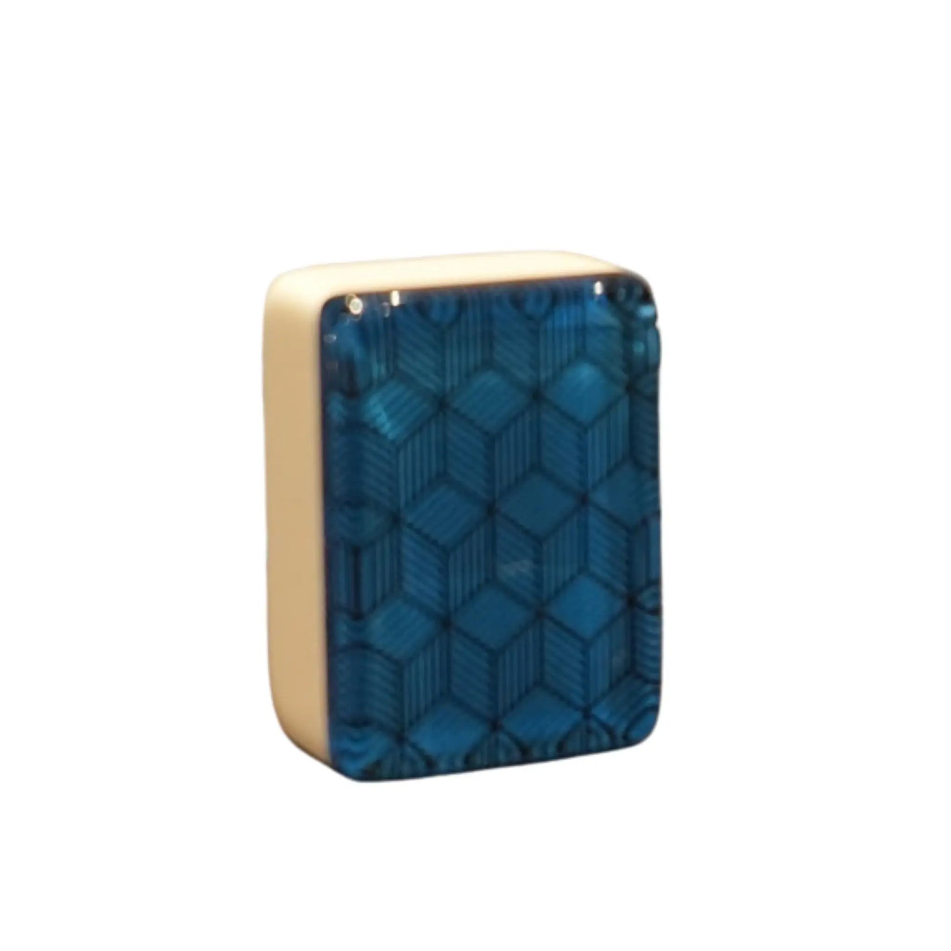 Close up view of a single blue deco weave mah jongg tile standing upright to show the geometric back pattern.