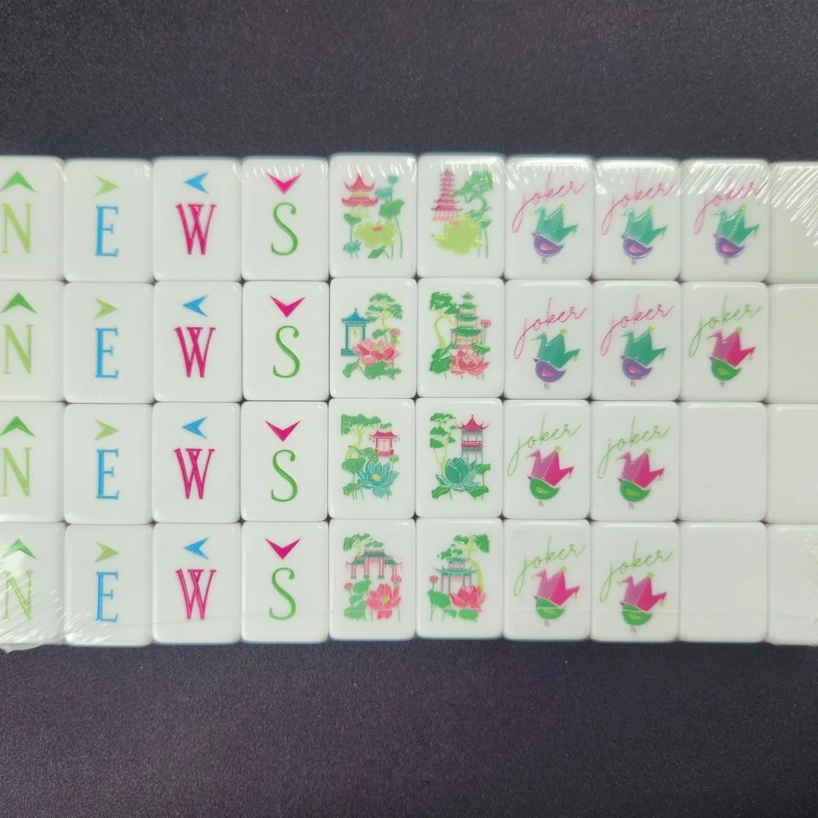 Tortoise Shell 30MM American Mah Jongg winds flowers jokers and specialty tiles arranged in rows