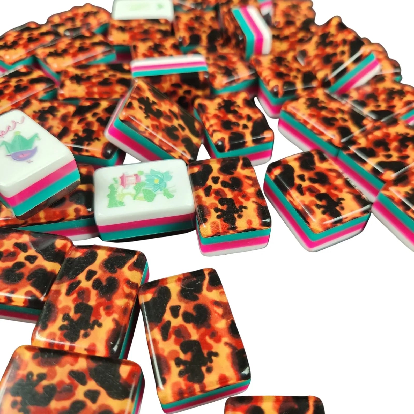 Side profile of Tortoise Shell 30MM American Mah Jongg tiles showing patterned backs and white faces
