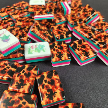 Tortoise Shell 30MM American mah jongg tiles displayed on tabletop with decorative backs
