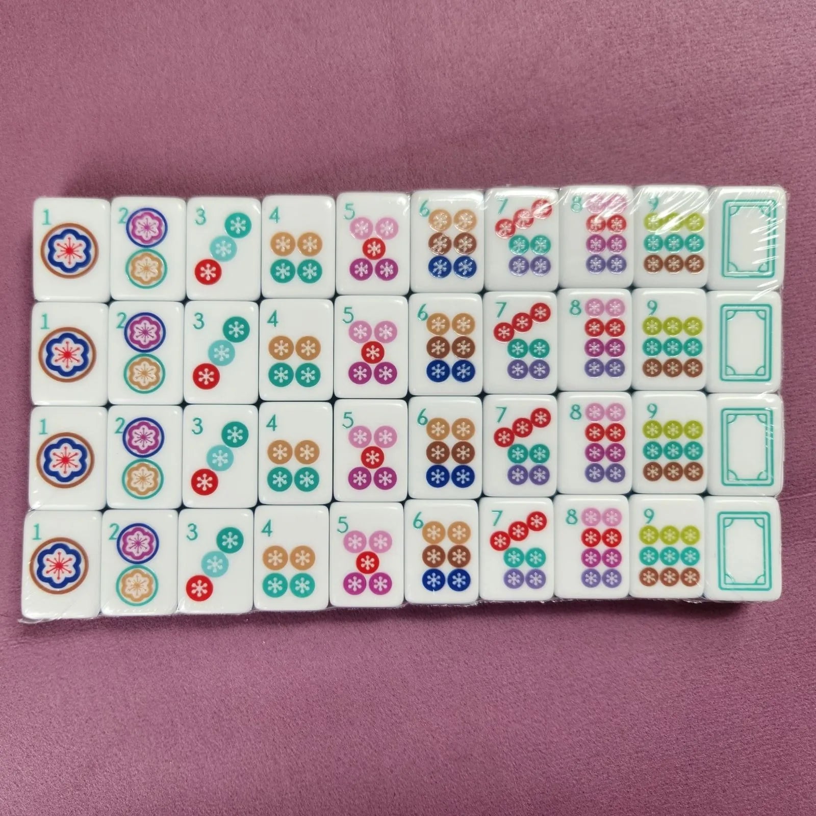 Watermelon 30MM American Mah Jongg dot suit tiles arranged in rows